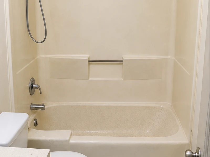 Faded crazed fiberglass tub in an Adams Point Oakland apartment before refinishing